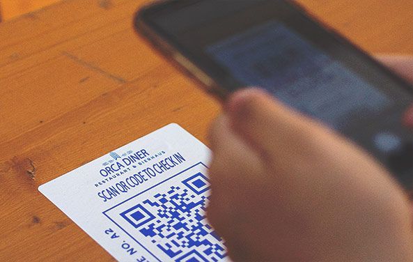 A smartphone scanning a QR code 