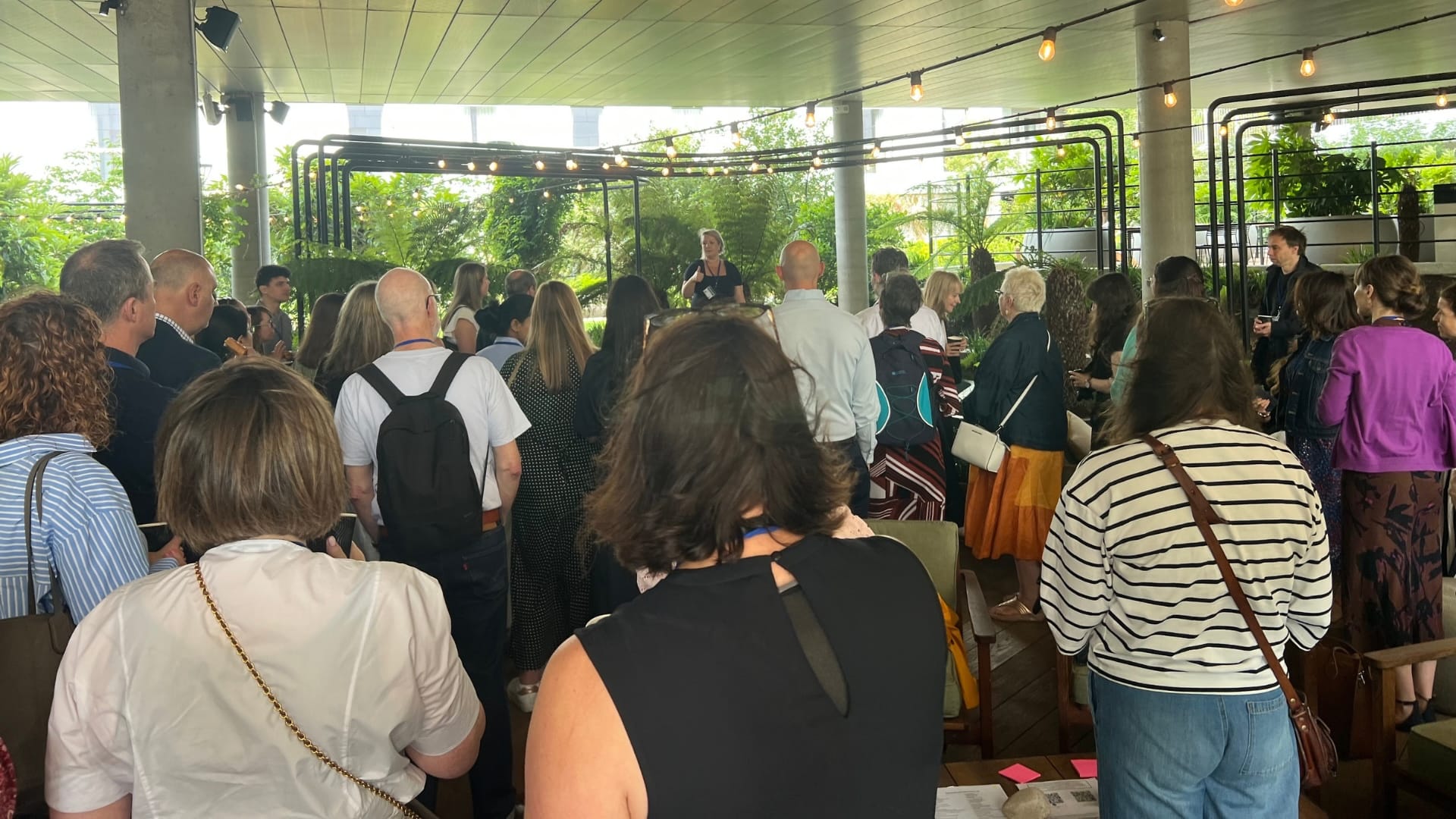 Rachel Hales welcoming attendees to a Get Synergised networking event in Cambridge